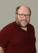 Greg headshot BG1