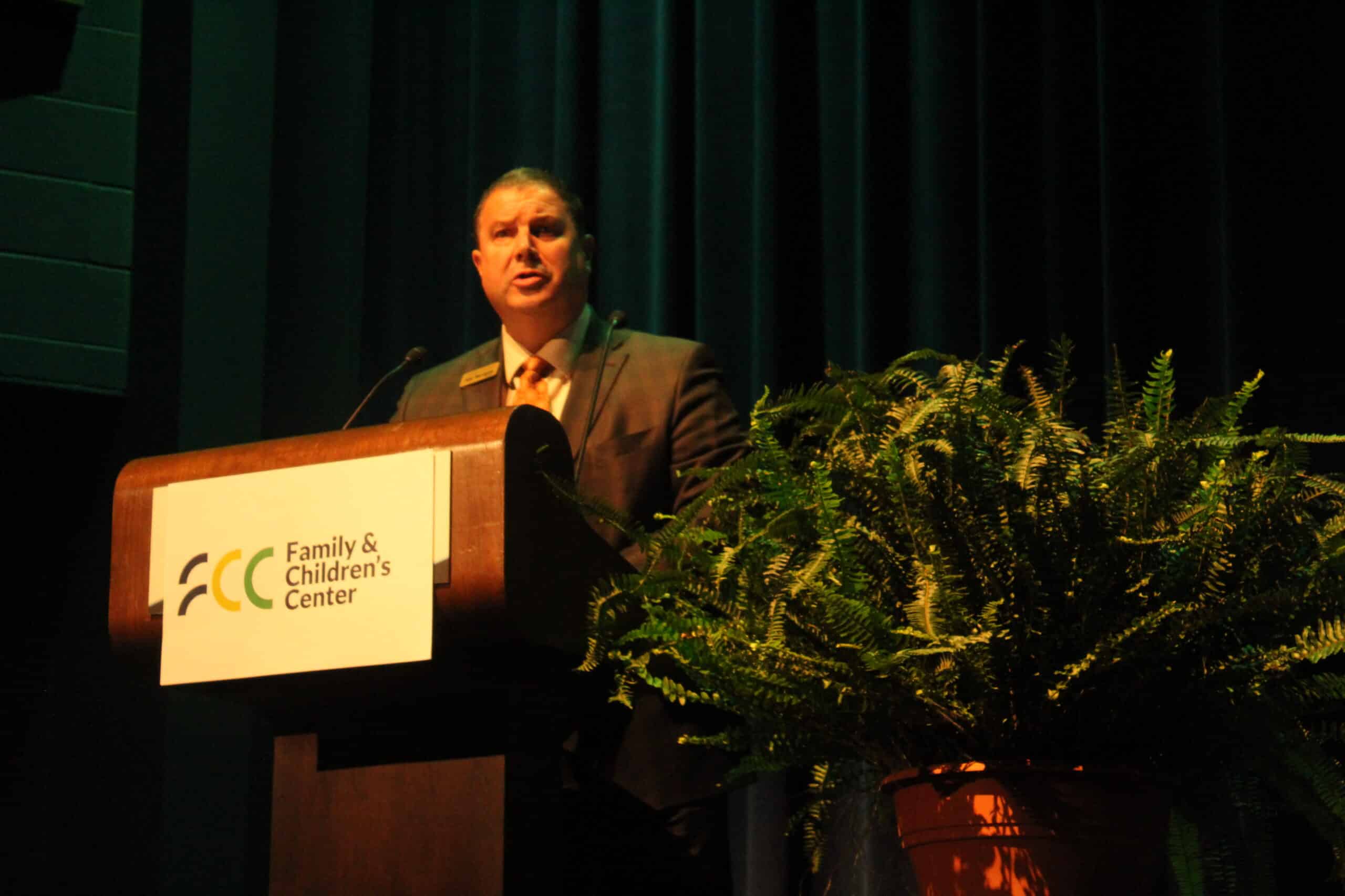 Board Chair Guzzo at Podium
