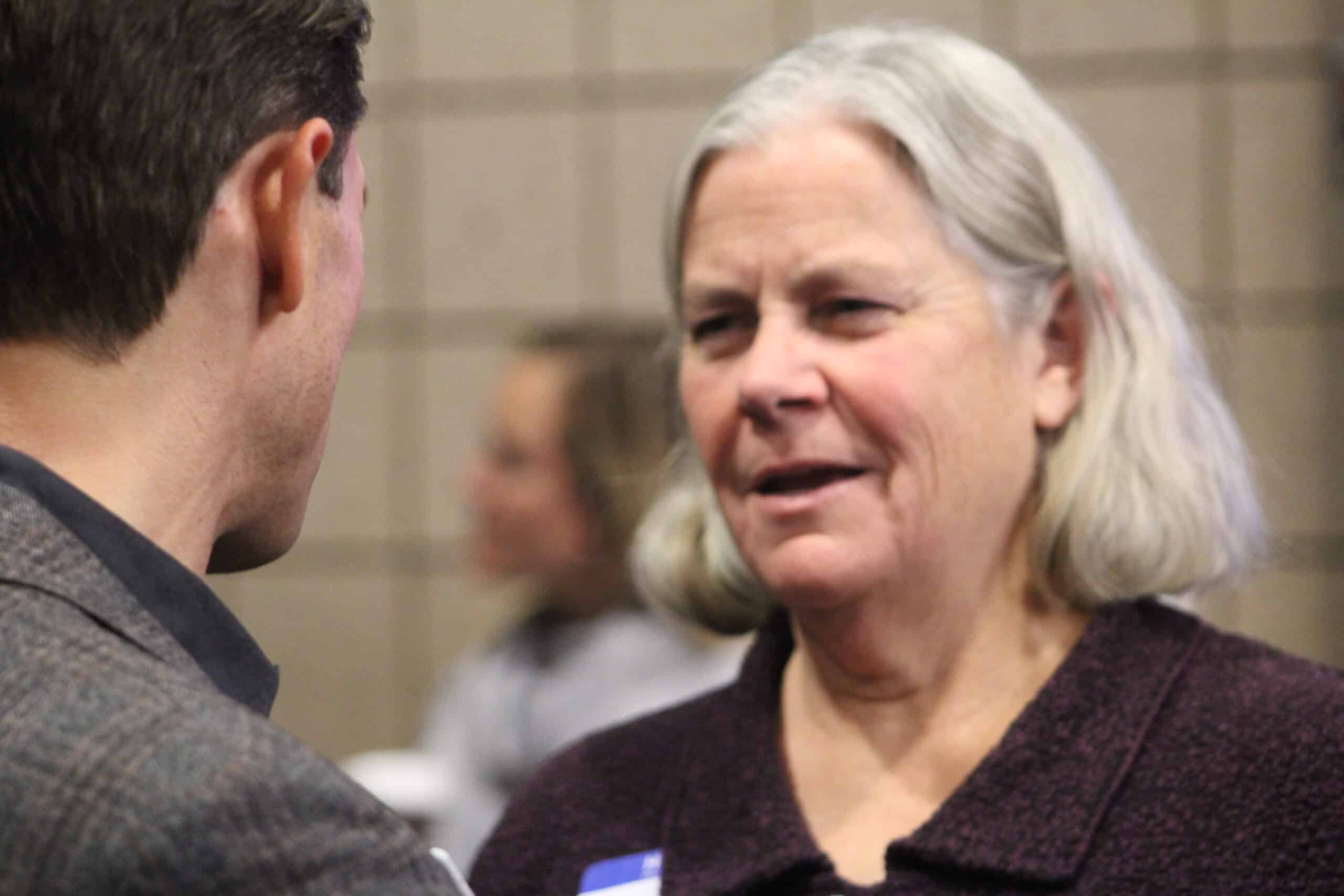 Tara Johnson speaks with guest ahead of event